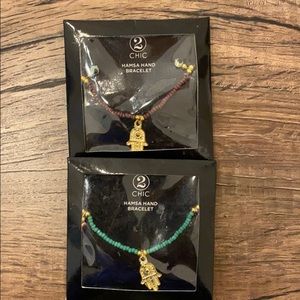 Two Hamsa hand bracelets with glass bead